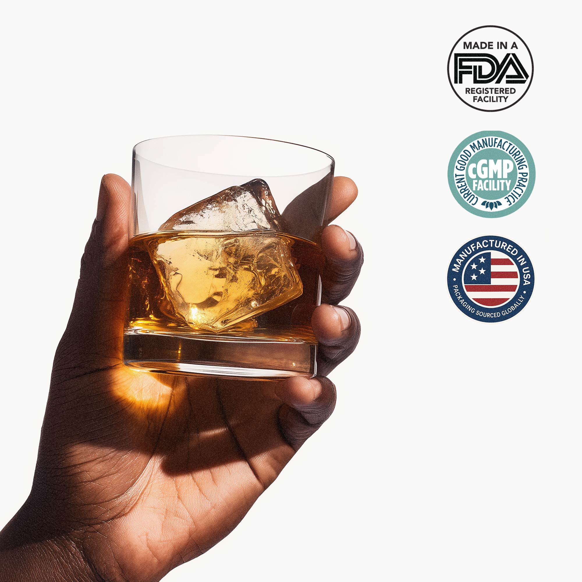 Hand holding a glass of Driftology Chamomile Nightcap with ice, featuring FDA and GMP logos on a white background
