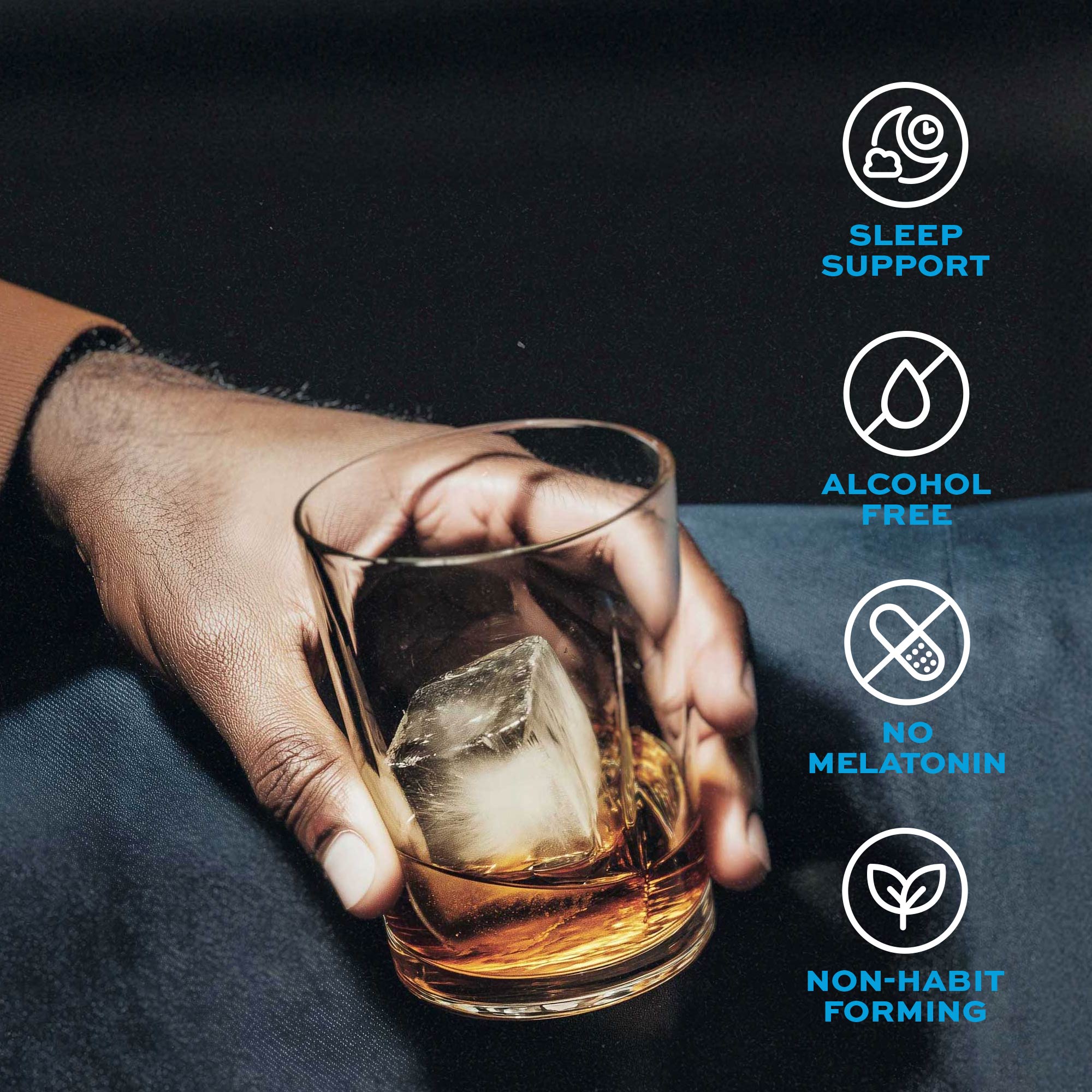 Hand holding a glass of alcohol-free Driftology nightcap with ice cubes on a dark background, featuring icons about product benefits.