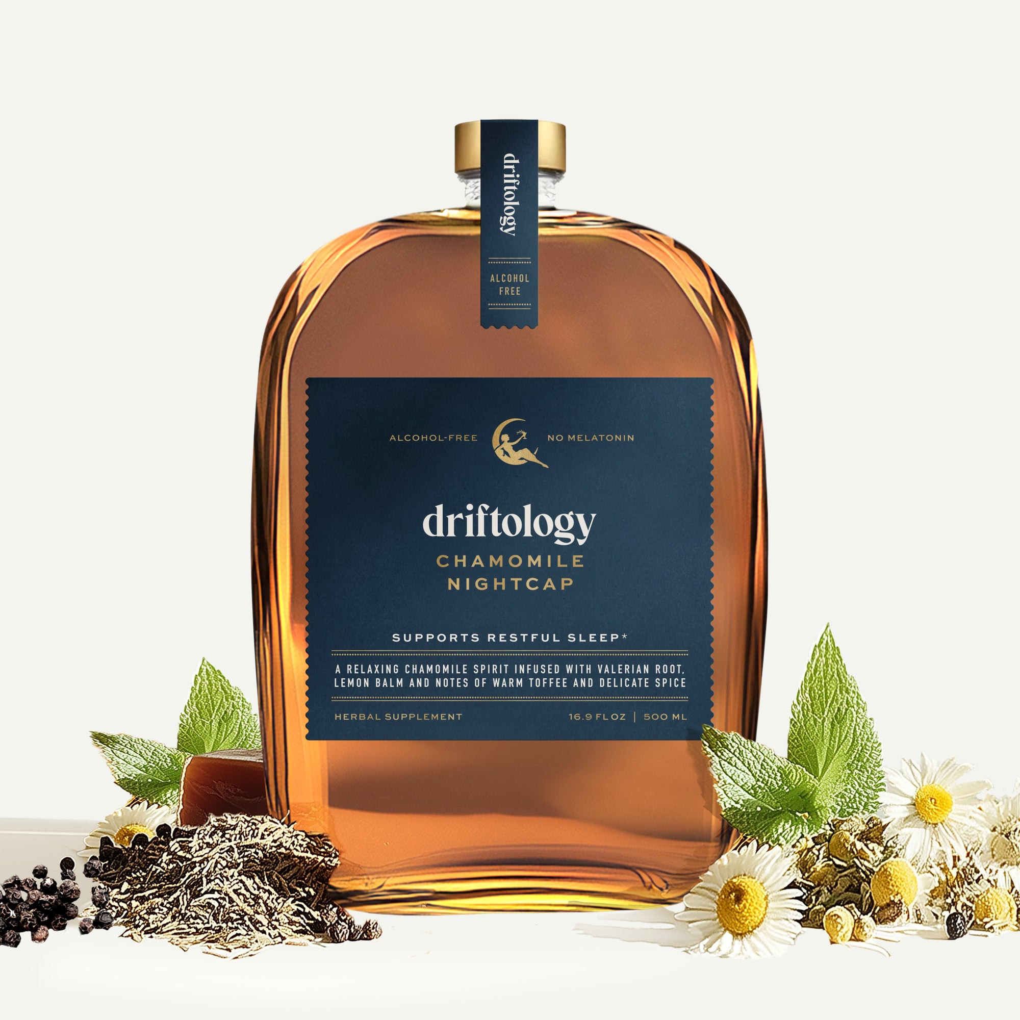 Bottle of Driftology Chamomile Nightcap with herbs and ingredients on a white background